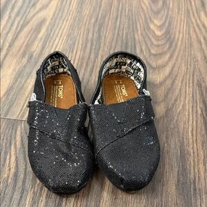 TOMS Kids Glittery Black Moccasins